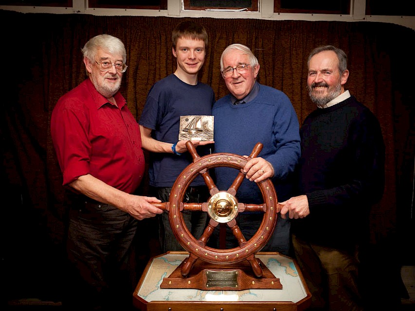 Loic is also pictured with the trophy-makers. From the left Ian Smith, Loic Jacobs, Laurie Robertson and Terry Atkinson.