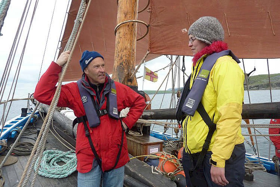 Artist Imi Maufe with Swan trustee, John Goodlad aboard the SWAN