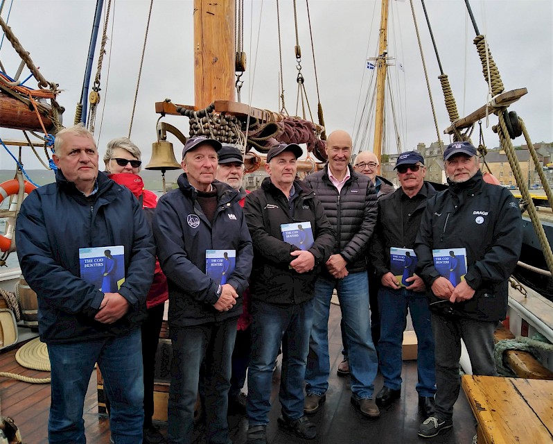 The Faroese boat skippers and Swan Trust Trustees pose for a picture following the presentation