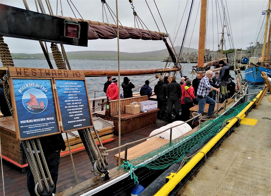 The presentation took place aboard Westward Ho, the oldest boat in the visiting Faroese fleet