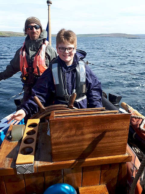 Another Happyhansel pupil enjoys his turn at the helm