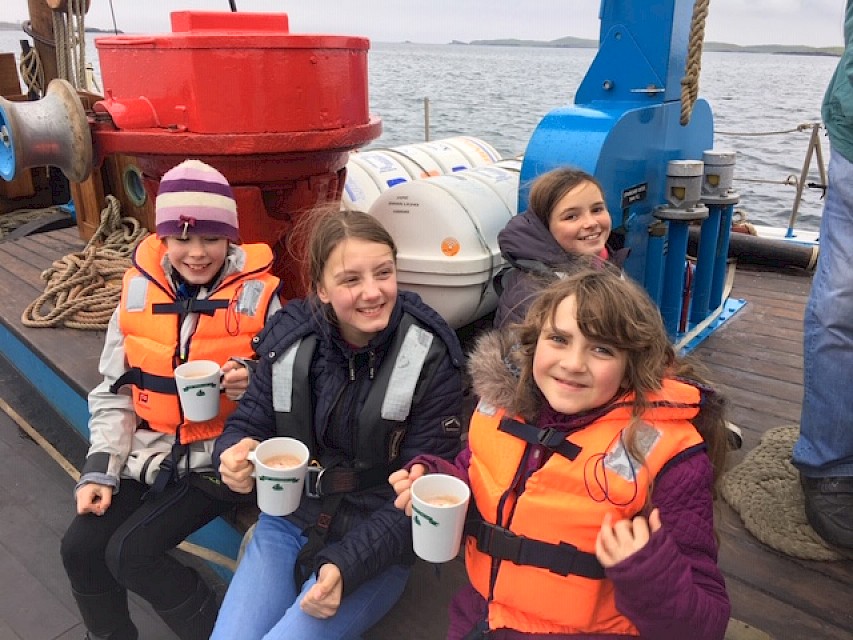 Whiteness pupils enjoy a rest and hot drink