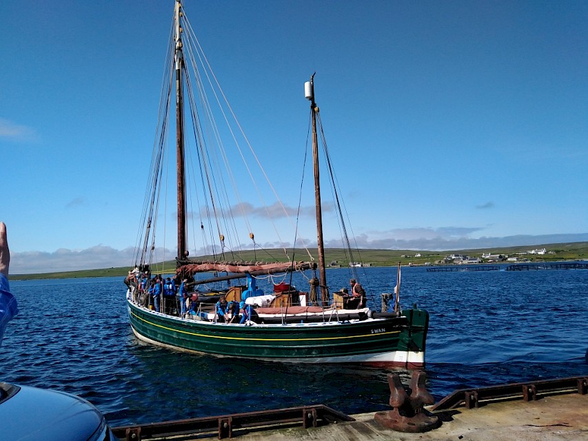 One Step Beyond Charter casting off in Uyeasound, Unst