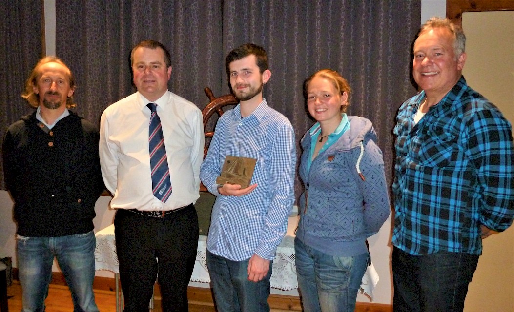 Receiving the 2019 Vevoe Trophy, with Swan Skipper Thorben Reinhardt, Award Presenter Aubrey Jamieson, Swan Mate Maggie Adamson and Swan Trustee Tommy Allan