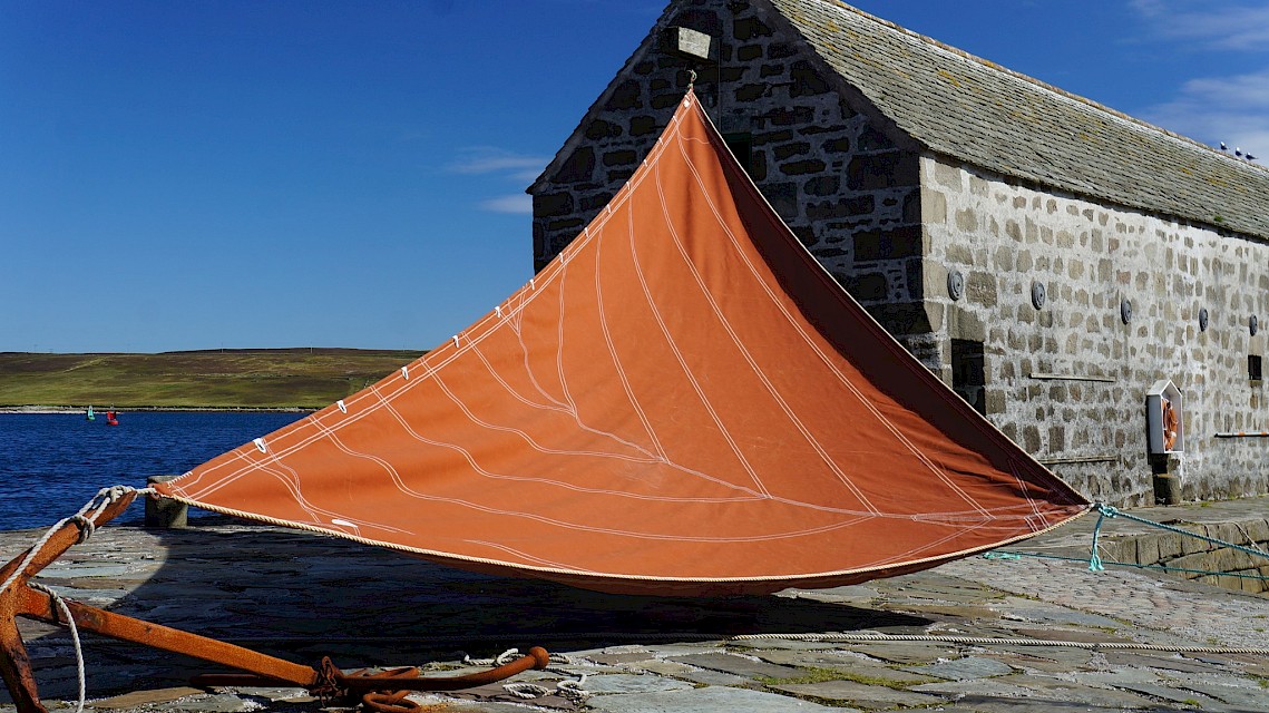 The replacement Jib sail which was funded/received earlier this year