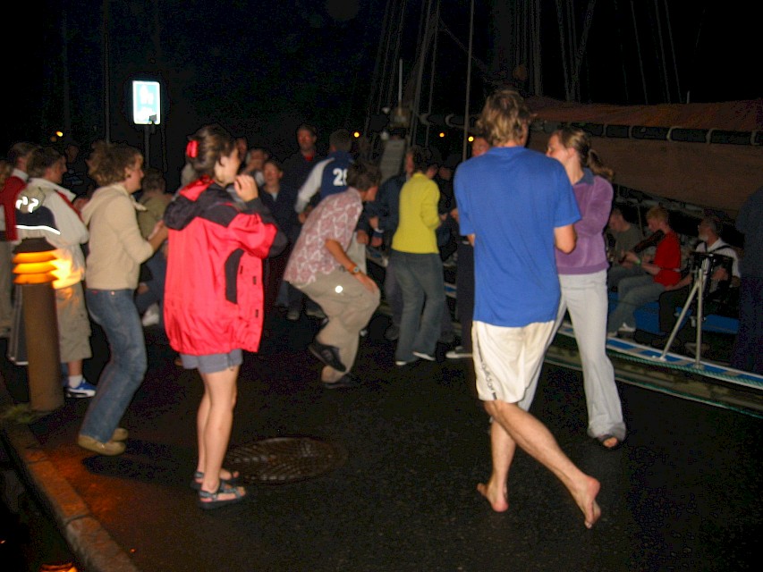 2004 - Dancing in one of the pier strip the willows - you can see the musicians onboard swan in the background