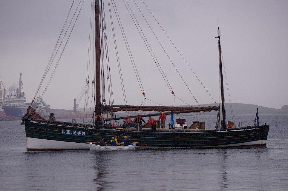 The Smaa Boat alongside the Swan, in 2015