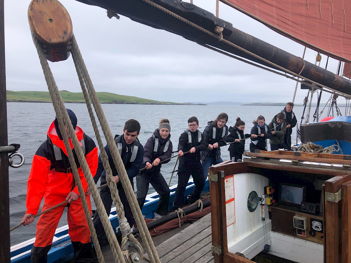 Trainees hauling a rope - L to R Willum Tulloch, Jamie Petrie, Jess Fraser, Ronan Laurenson, Jaime Boyle, Sonia Poniecka, Jess Wadley, Logan Paton, Beren Serginson