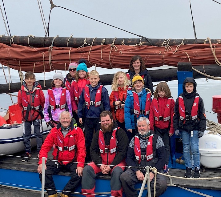 Baltasound primary pupils with school staff and Swan crew