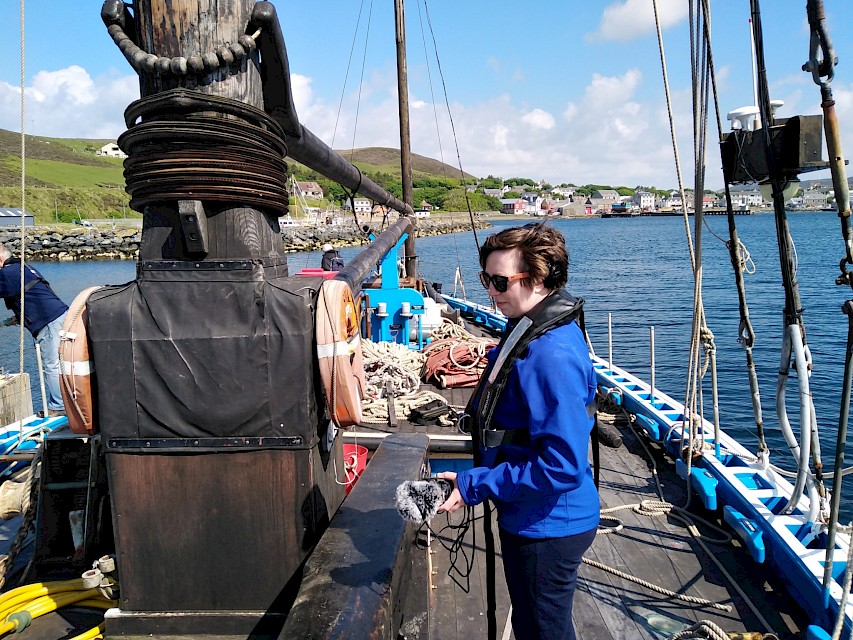 Jen Stout, of BBC Radio Shetland, aboard the Swan with her recording equipment