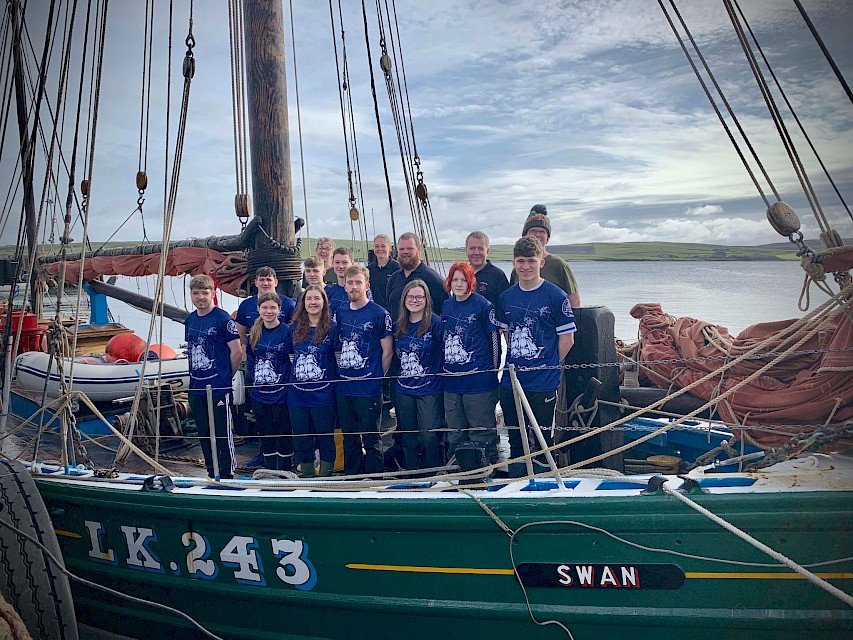 First group of Trainees before departure from Lerwick. From left to right: Connor Hughes, Ben Clayton, Kate Friel, Artur Vavilovs, Vaila Wright, Dianne Morrison (crew), Jack Sumner, Eldon Wigram, Maggie Adamson (Skipper), Scott Sandison (Mate), Jess Wadley, Izzy Gibson, Fraser Mouat (crew), Magnus Bullough, Michael Robertson (crew)