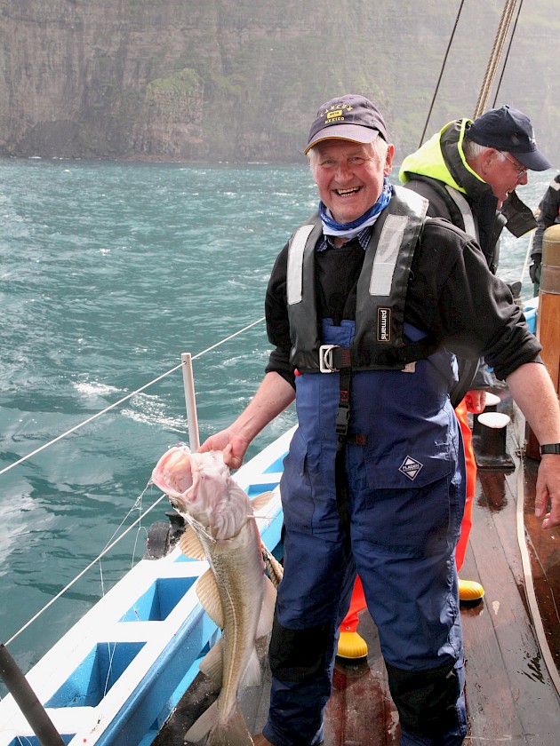 Ian Nicolson landing one of the many fish he has caught aboard the Swan