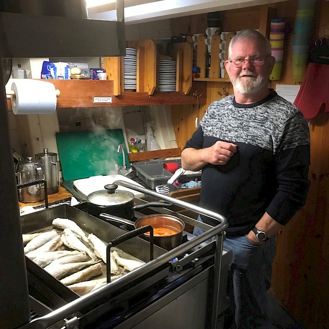 Peter cooking up a fry in the Galley
