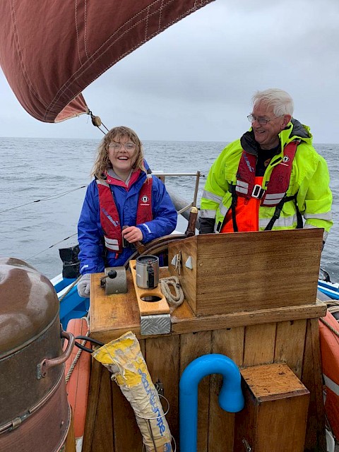 School pupil enjoys steering at the helm of the Swan