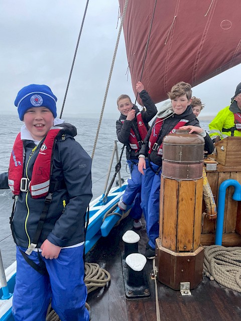 School pupils enjoying a trip on the Swan