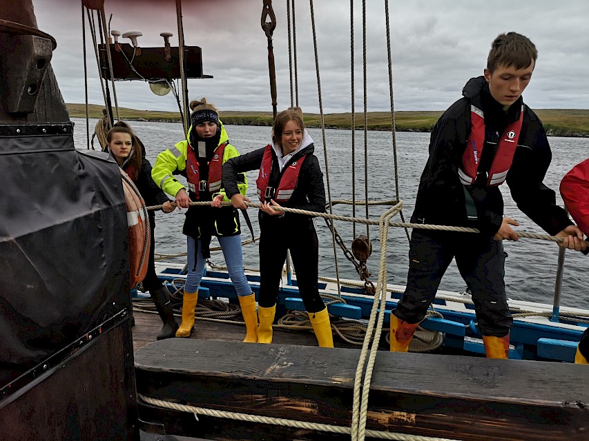 Mid Yell School Pupils hauling away