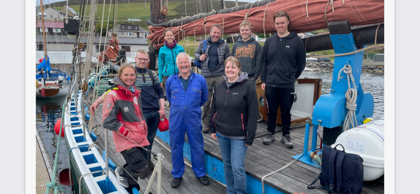 Ian and fellow volunteers following a maintenance session aboard