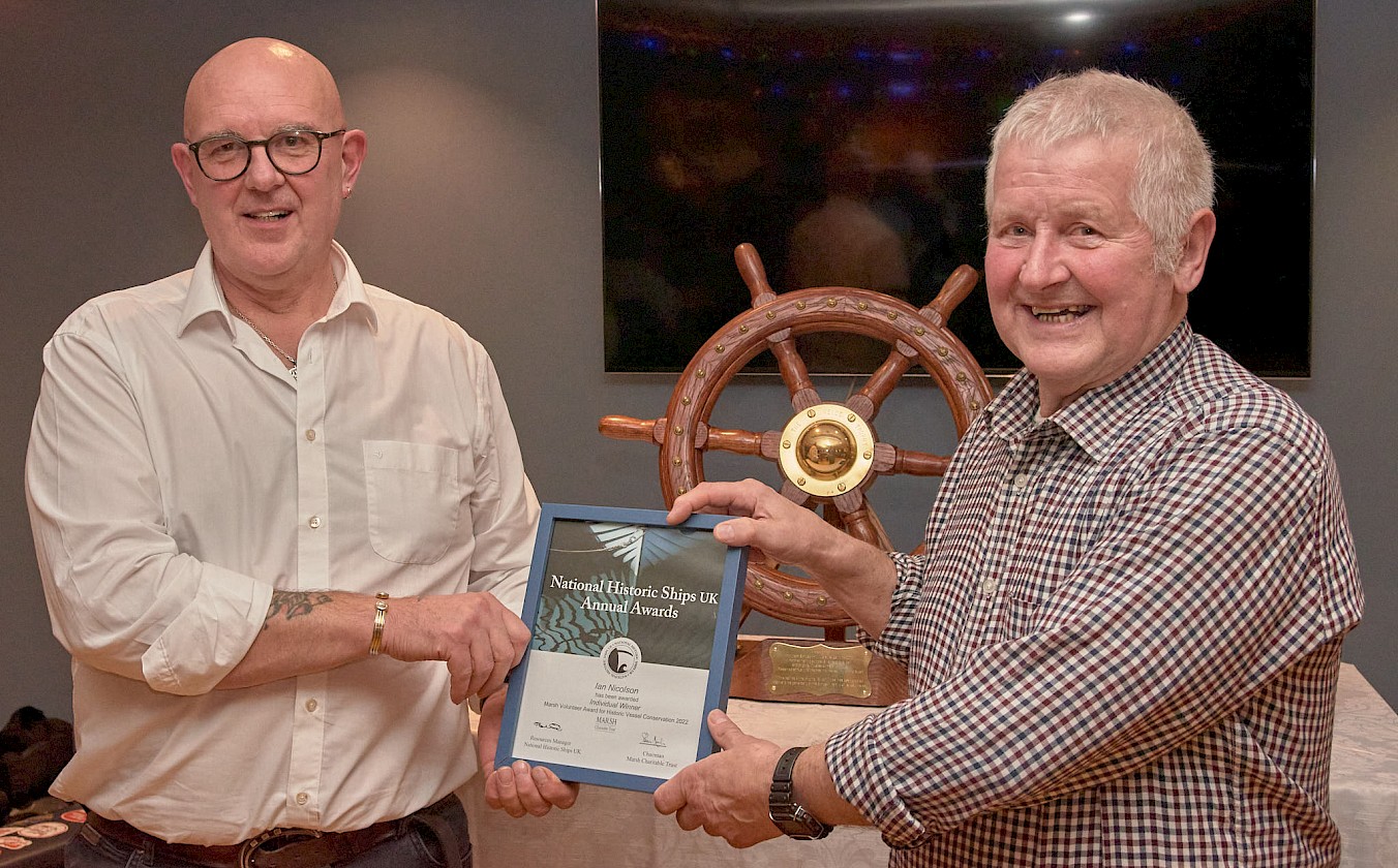 Swan Trust Chair, David Goodlad, presenting the Marsh Volunteer Award to Ian Nicolson