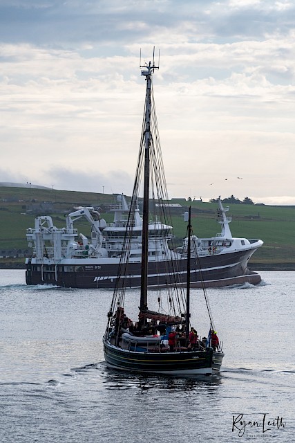 Old and new - Swan in Lerwick Harbour Sept 2021, with modern pelagic trawler Resolute. Image Ryan Leith