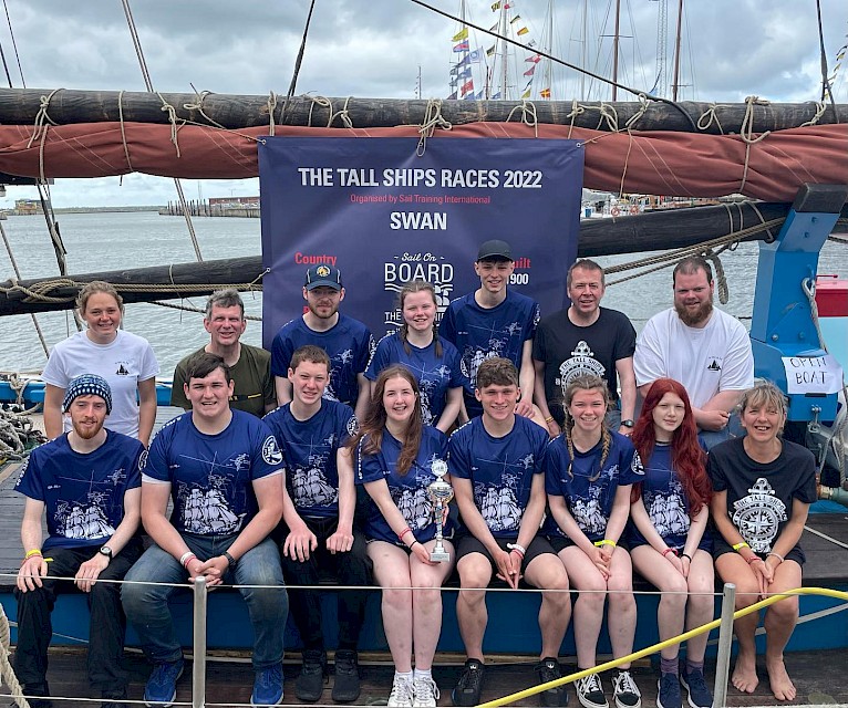 Swan crew and trainees with their Most Welcoming Ship award at The 2022 Tall Ships Races