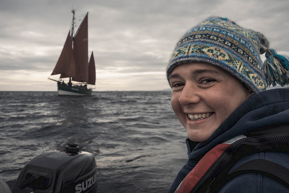Swan Skipper, Maggie Adamson, taking the photographer out on the dinghy to capture the Swan sailing, photographed by @kletspoot